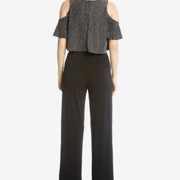 Karen Kane Sparkle Starlight Silver / Black
Cold Shoulder Jumpsuit
Size S - Picture 3 of 15